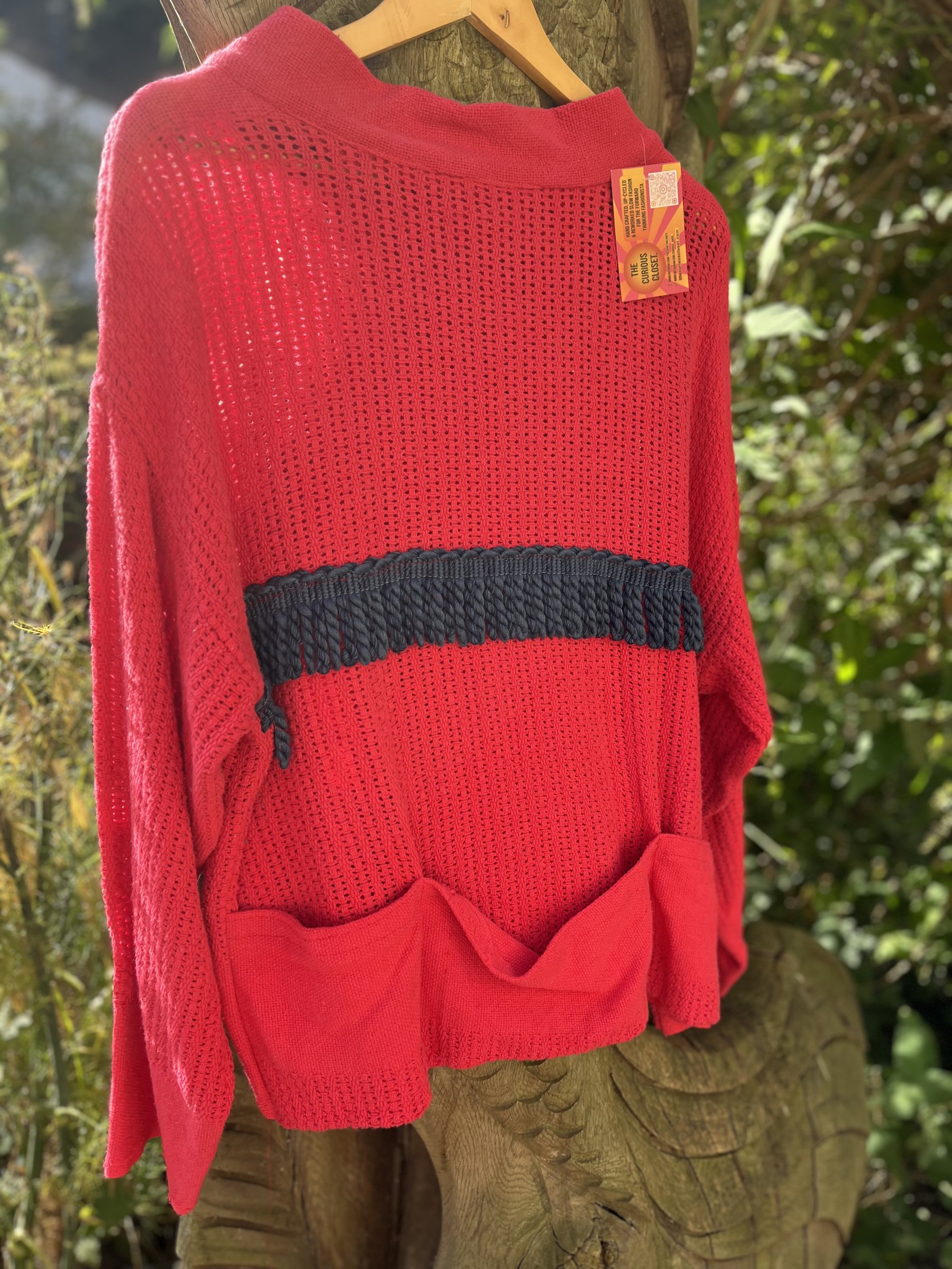 Red waffle with navy tassles.